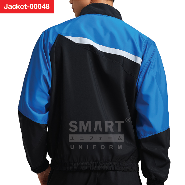 ด้านหลังดำแผงใหญ่ แต่งบ่าและแขนสีน้ำเงิน คาดแถบขาวโค้ง คอสูง ชายเอวสม็อค สวมสบายทั้งวัน